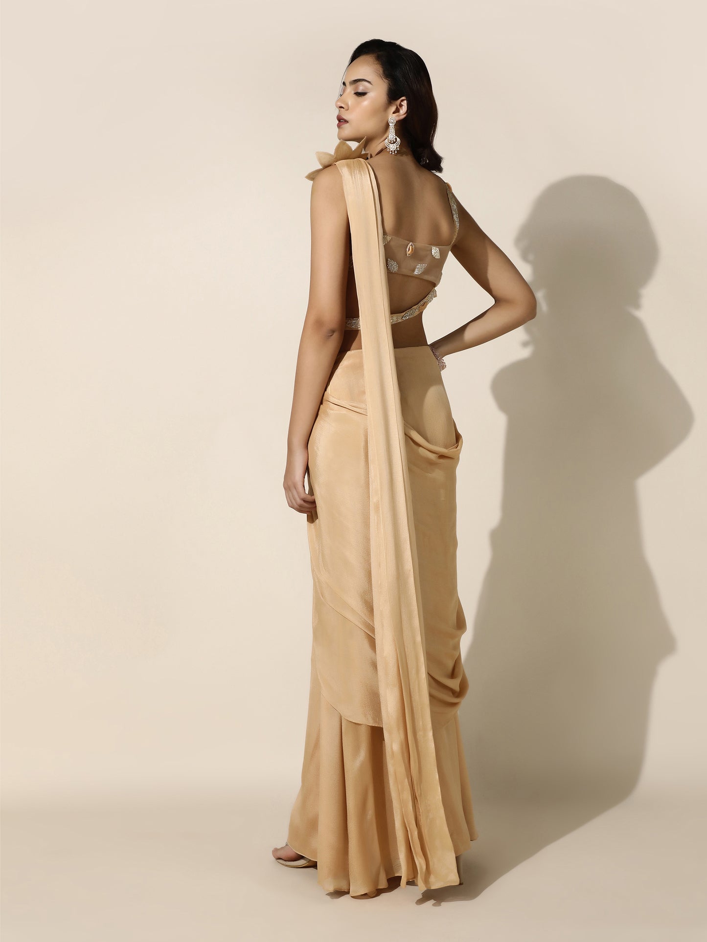 Gold Crushed Crepe Drape Saree with Cutwork Blouse and Flower Brooch on Shoulder