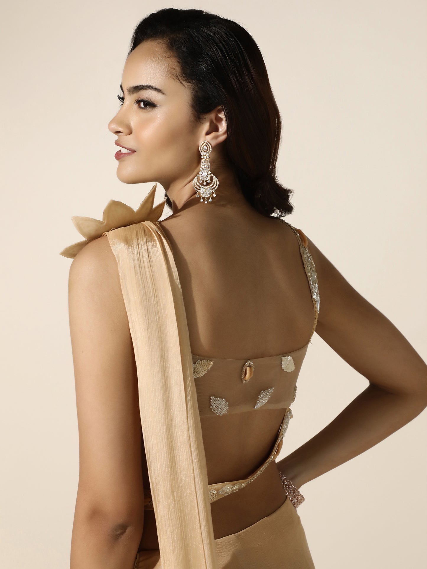 Gold Crushed Crepe Drape Saree with Cutwork Blouse and Flower Brooch on Shoulder