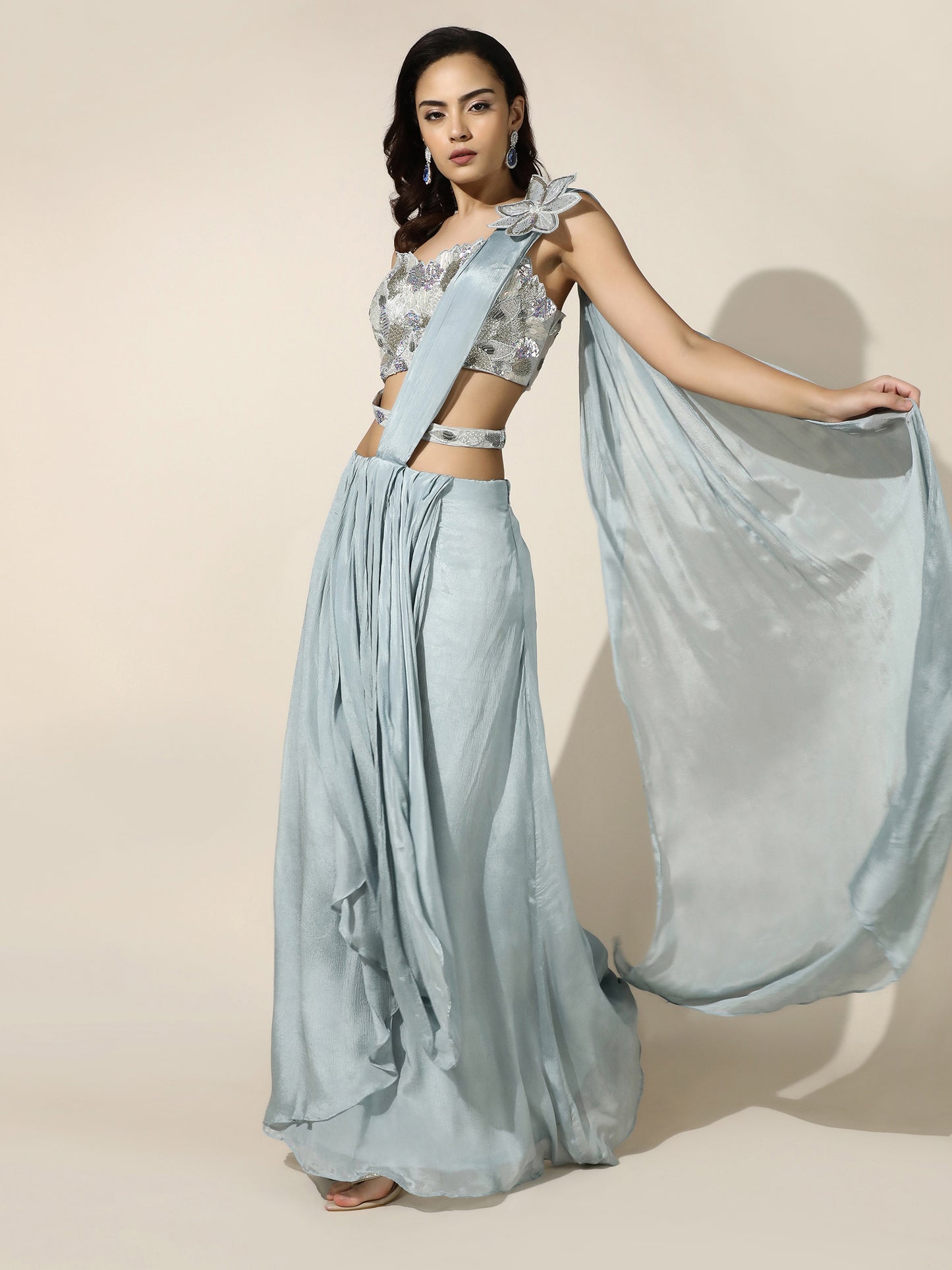 Sky Blue Crushed Crepe Drape Saree with Cutwork Blouse and Flower Brooch on Shoulder