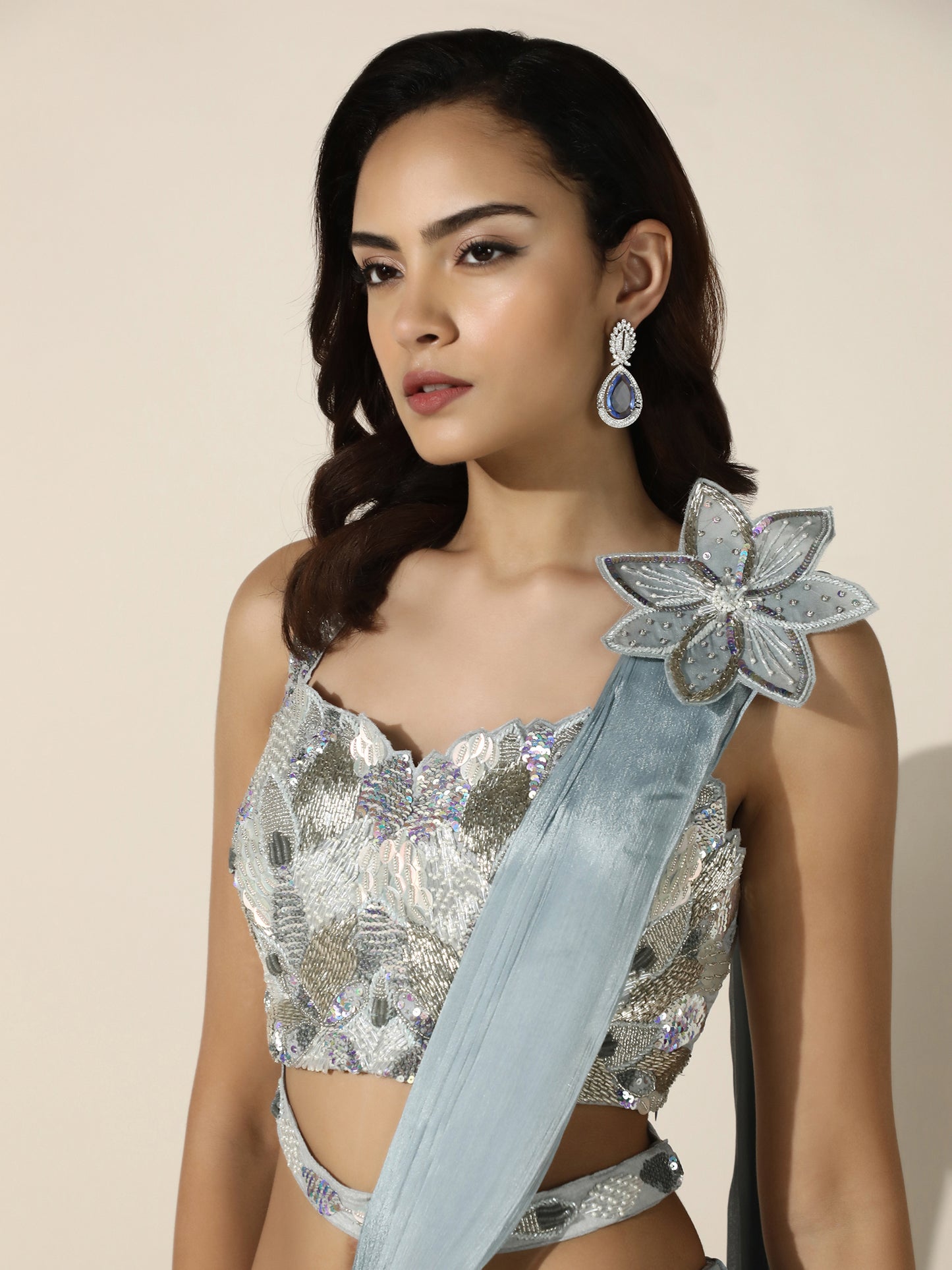 Sky Blue Crushed Crepe Drape Saree with Cutwork Blouse and Flower Brooch on Shoulder