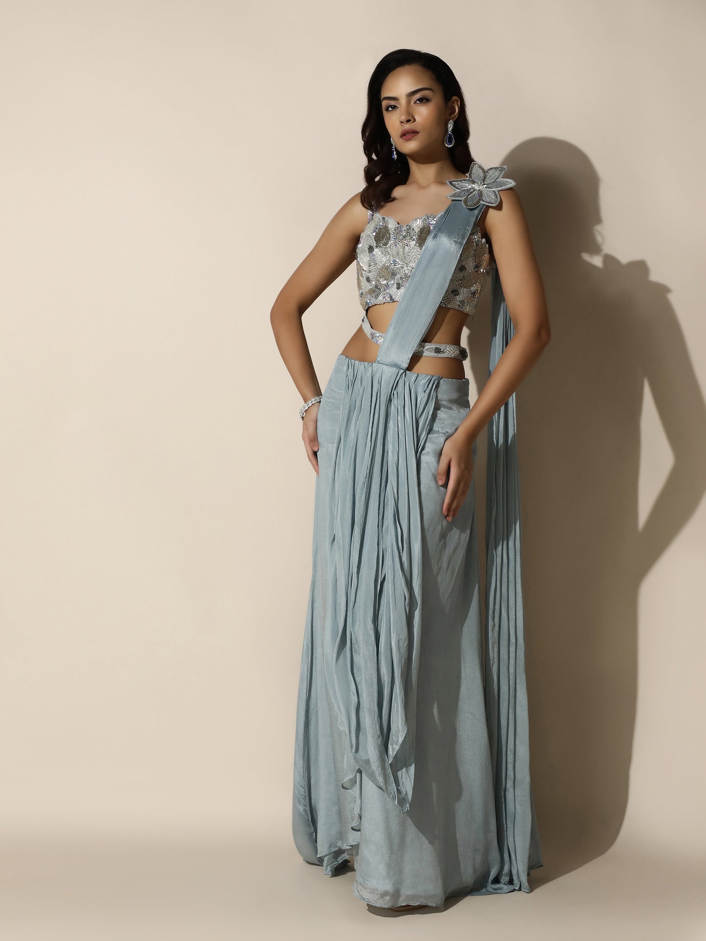 Sky Blue Crushed Crepe Drape Saree with Cutwork Blouse and Flower Brooch on Shoulder