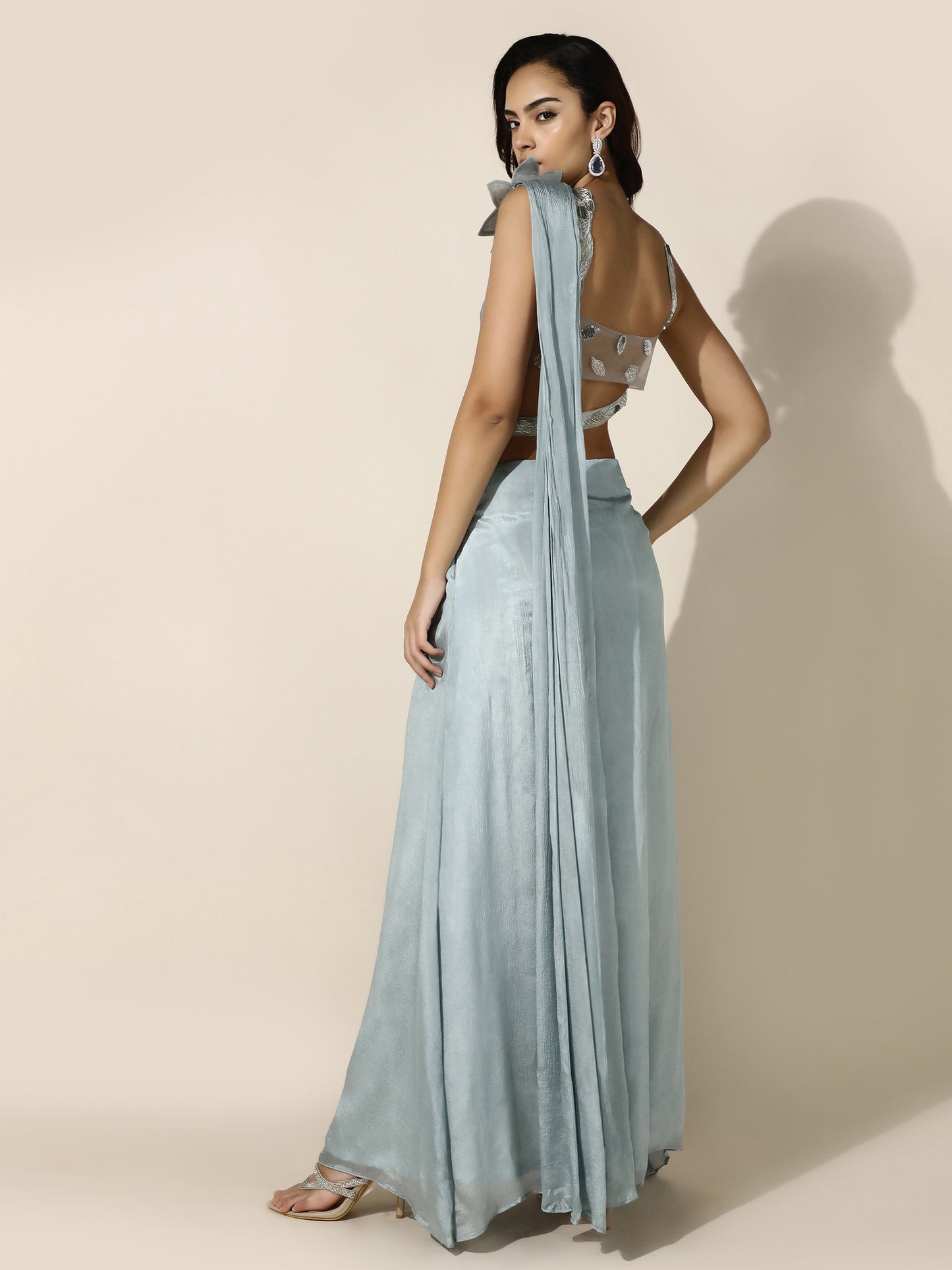 Sky Blue Crushed Crepe Drape Saree with Cutwork Blouse and Flower Brooch on Shoulder
