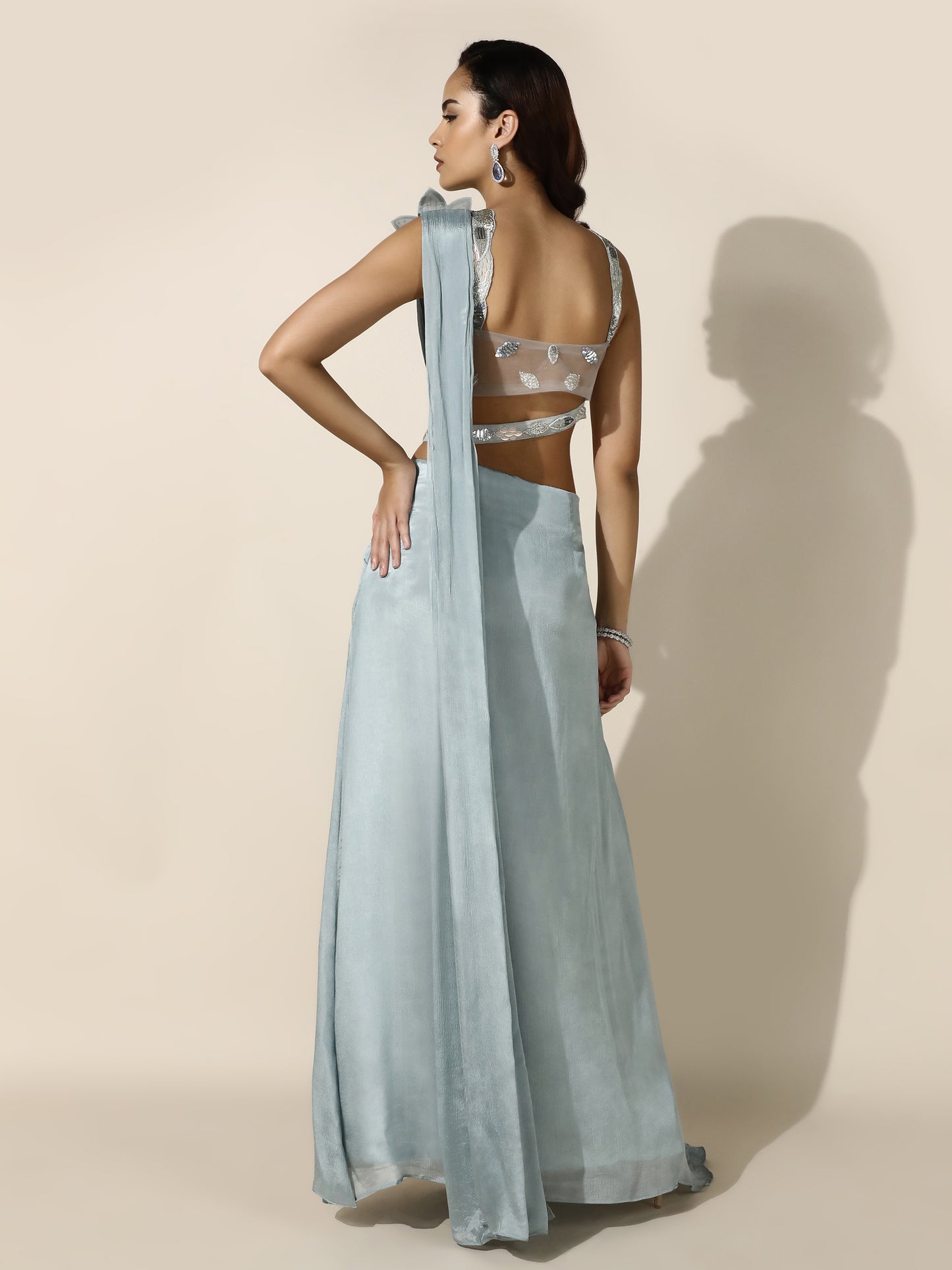 Sky Blue Crushed Crepe Drape Saree with Cutwork Blouse and Flower Brooch on Shoulder