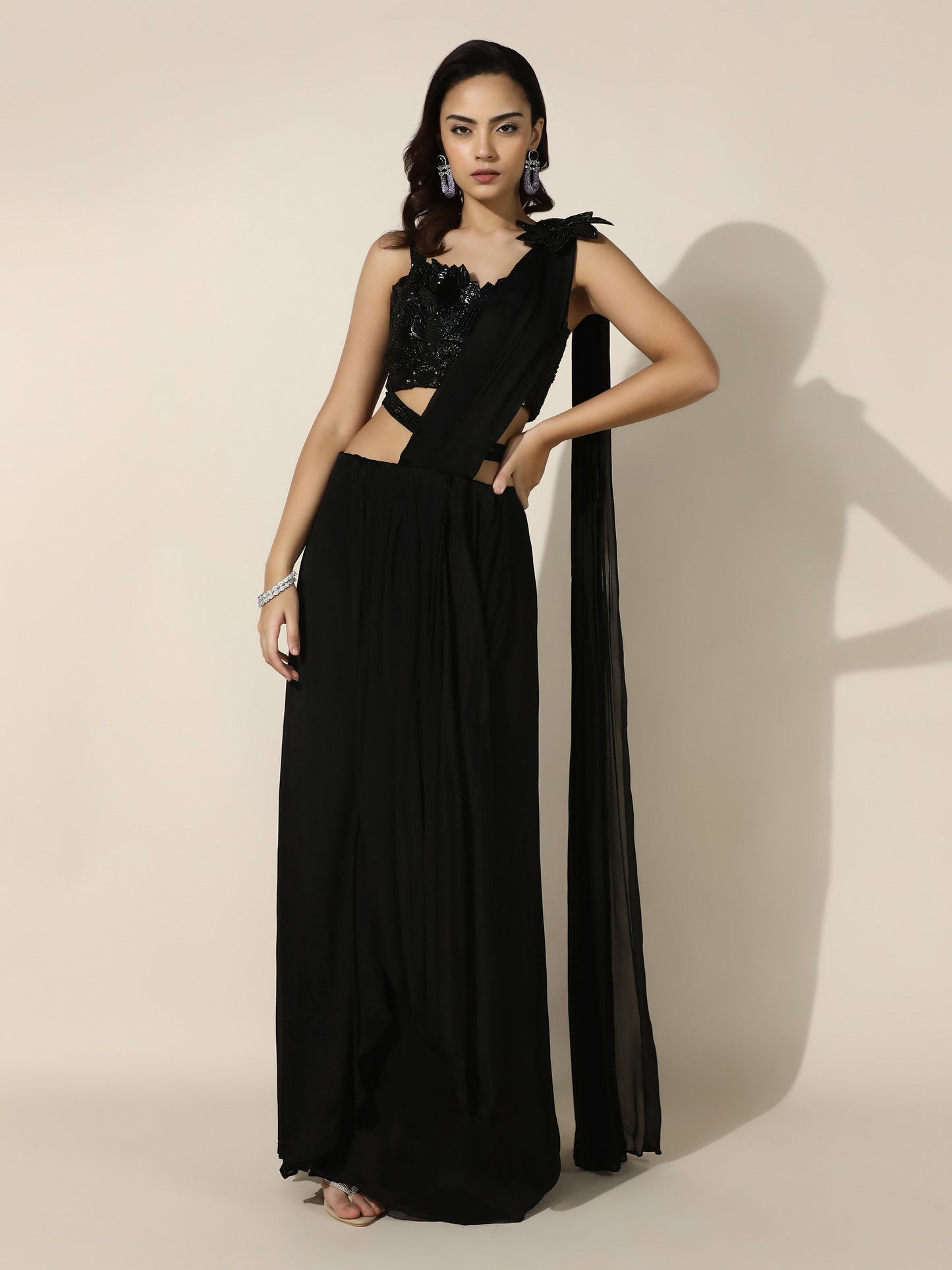 Black Crushed Crepe Drape Saree with Cutwork Blouse and Flower Brooch on Shoulder