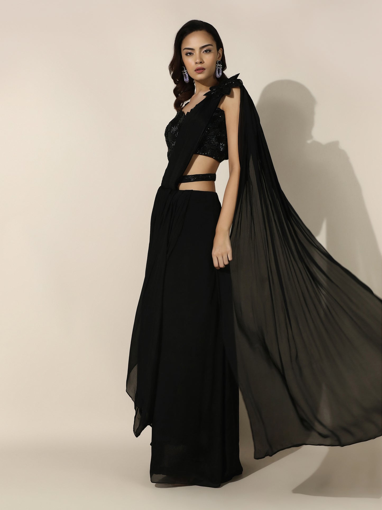 Black Crushed Crepe Drape Saree with Cutwork Blouse and Flower Brooch on Shoulder