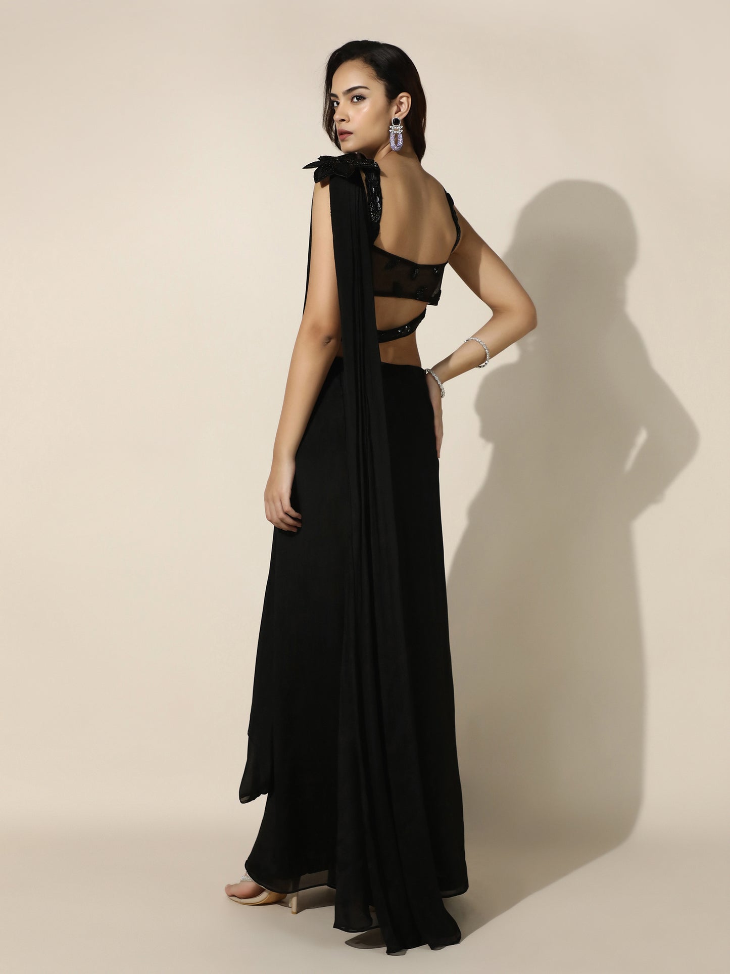 Black Crushed Crepe Drape Saree with Cutwork Blouse and Flower Brooch on Shoulder