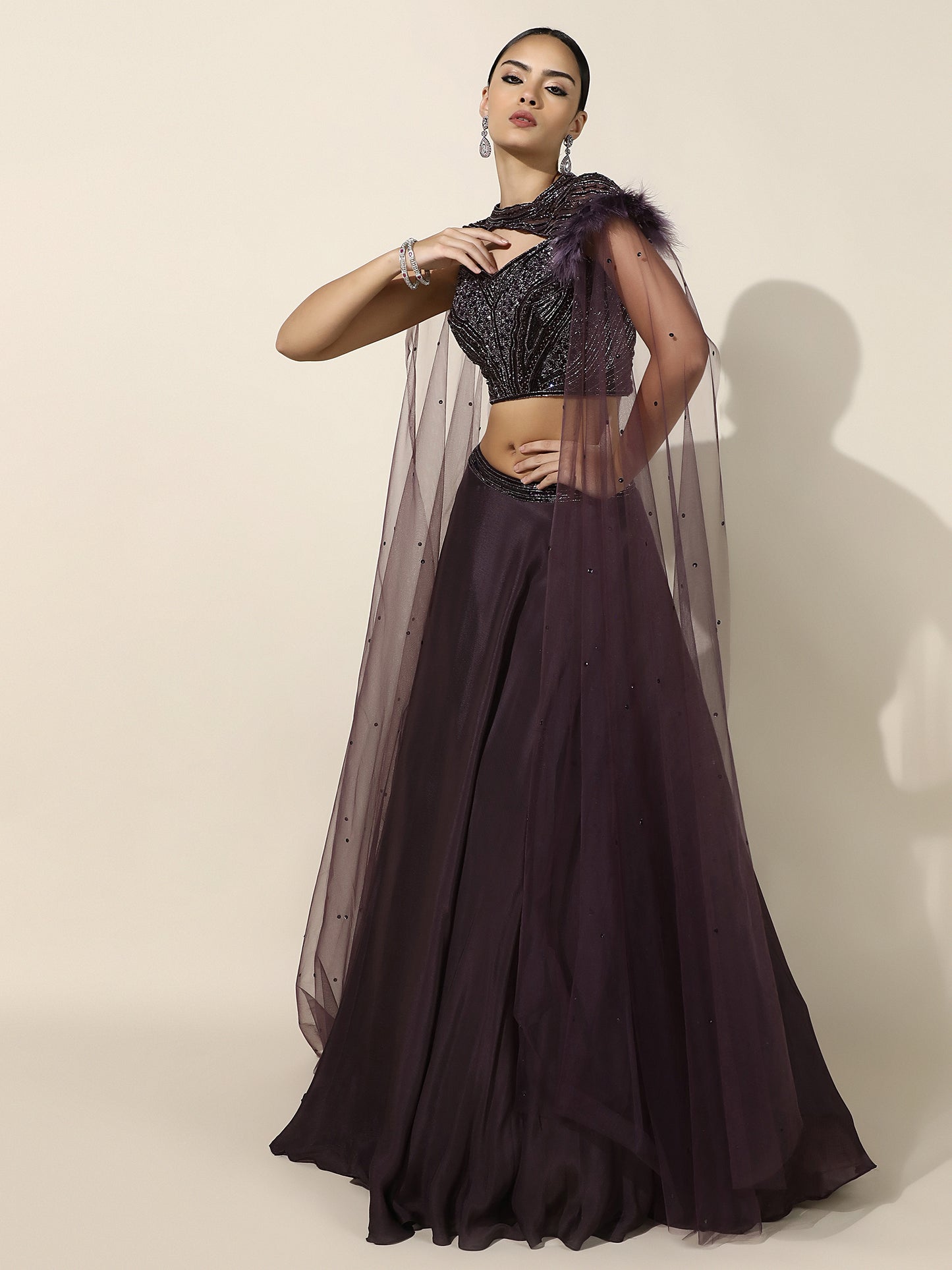 Purple Crepe Lehenga with Embroidered Shoulder Cape and Feather Detail
