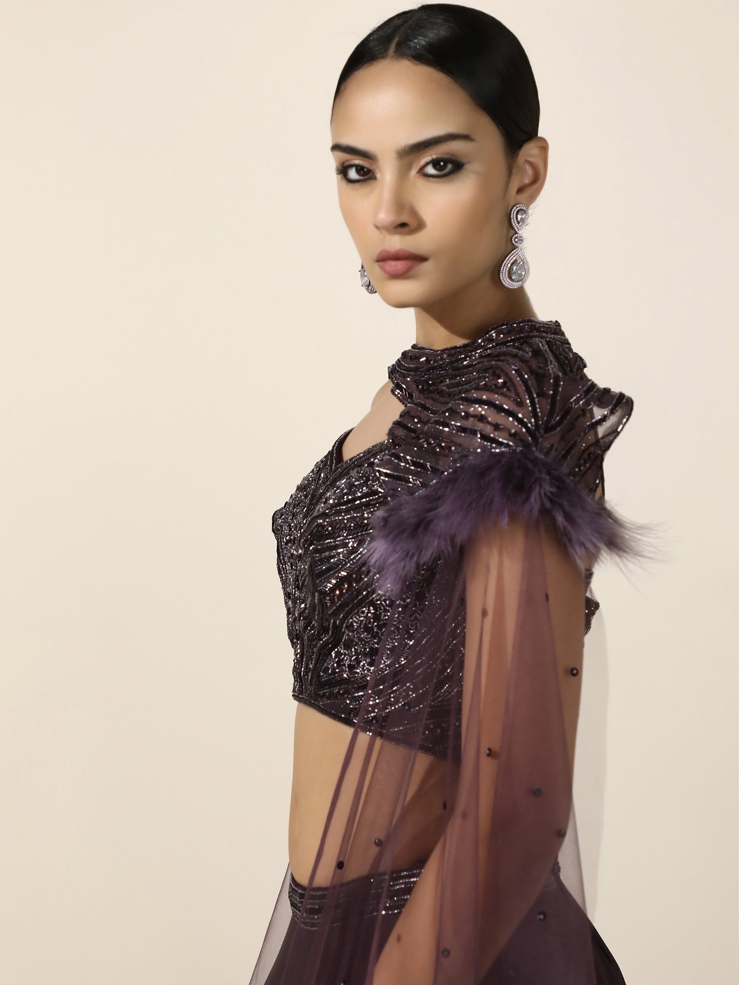 Purple Crepe Lehenga with Embroidered Shoulder Cape and Feather Detail