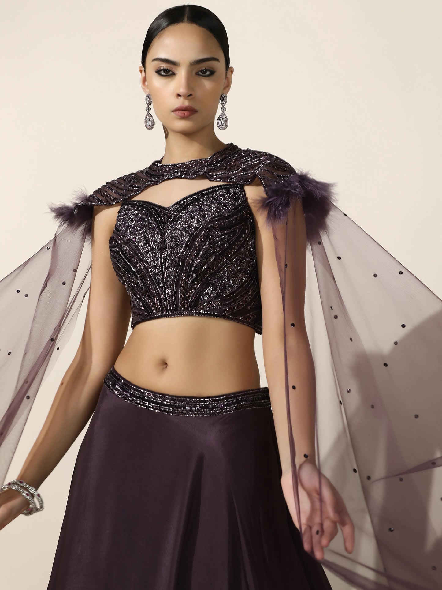 Purple Crepe Lehenga with Embroidered Shoulder Cape and Feather Detail