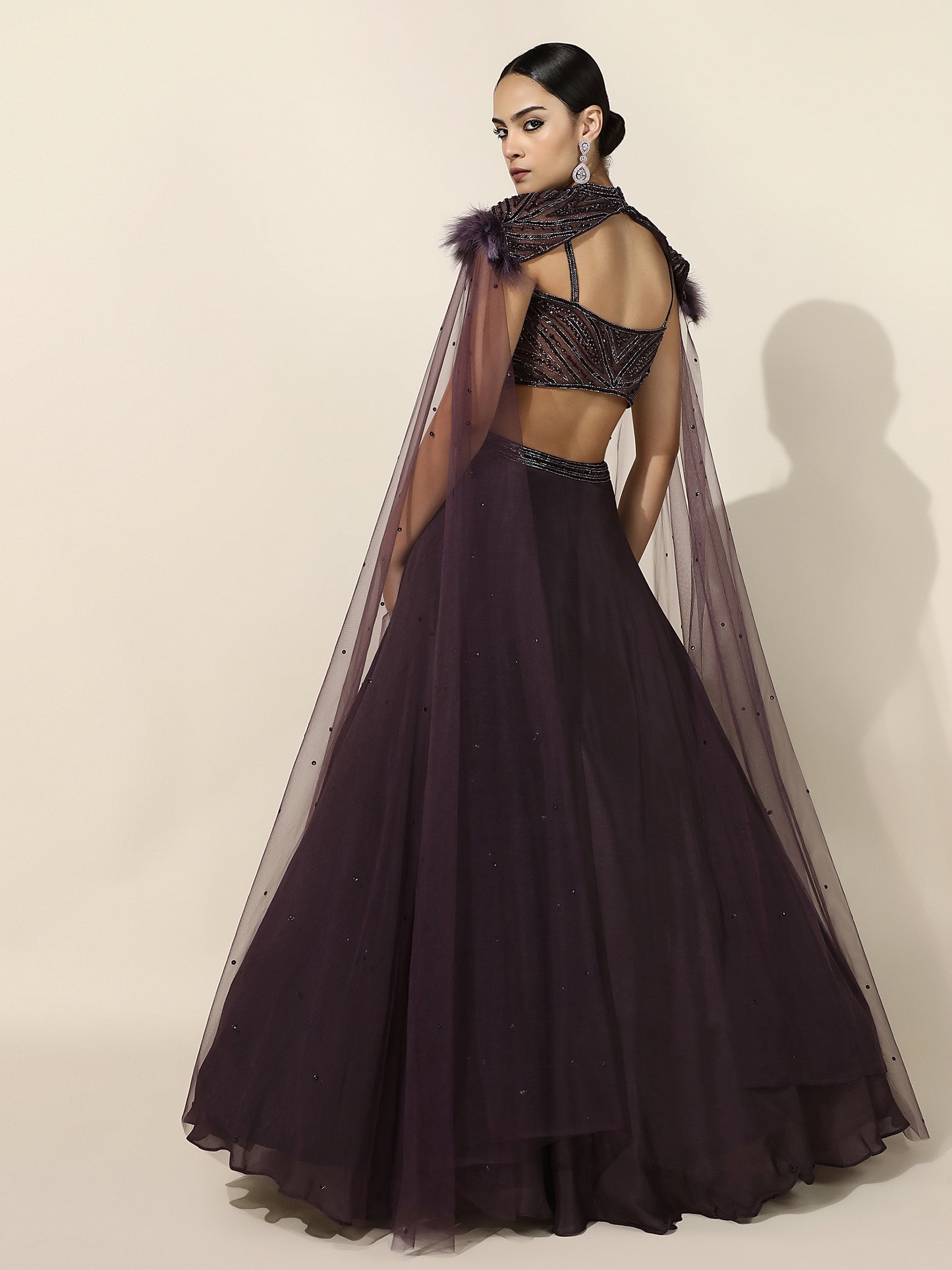 Purple Crepe Lehenga with Embroidered Shoulder Cape and Feather Detail