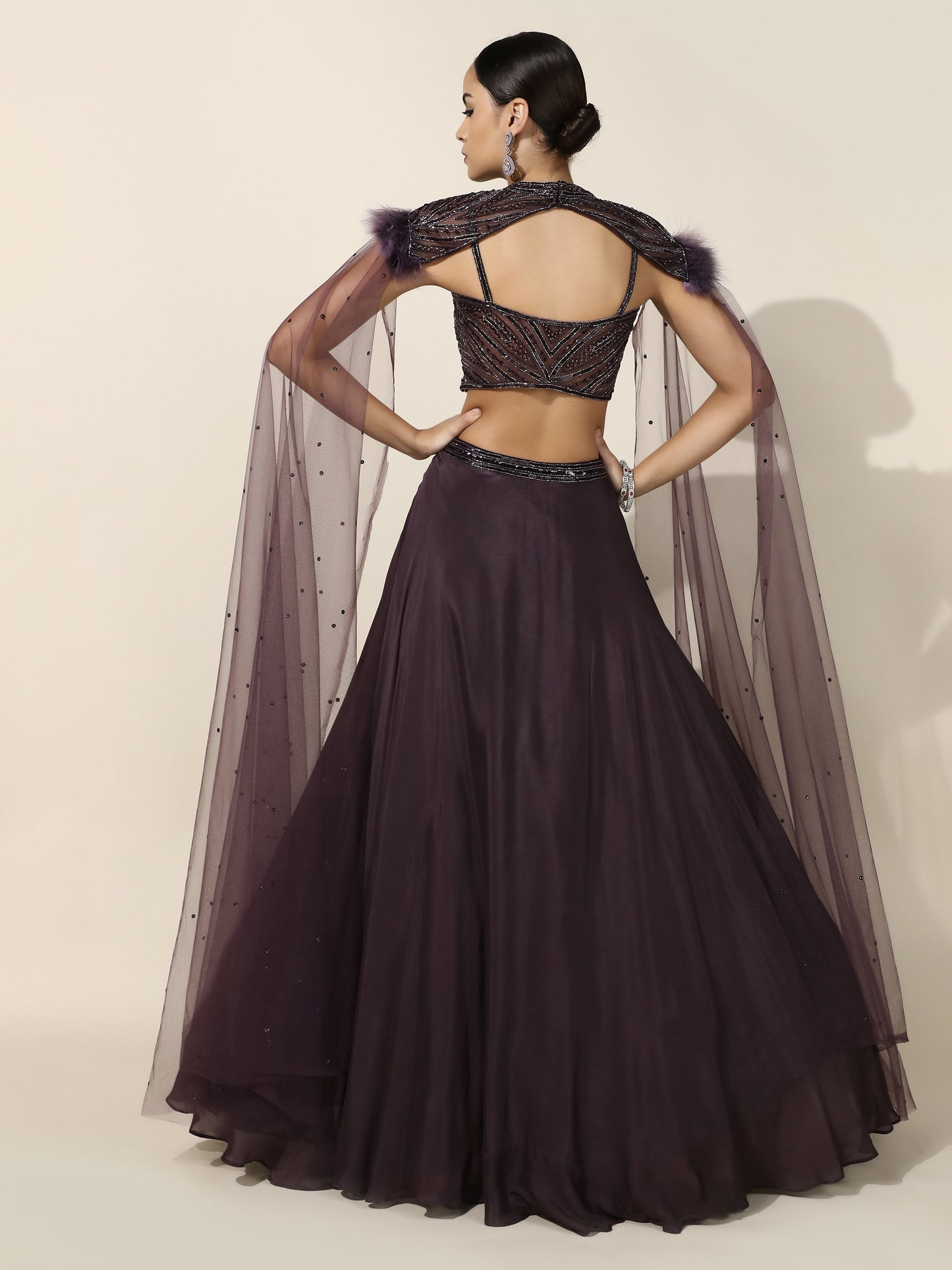 Purple Crepe Lehenga with Embroidered Shoulder Cape and Feather Detail