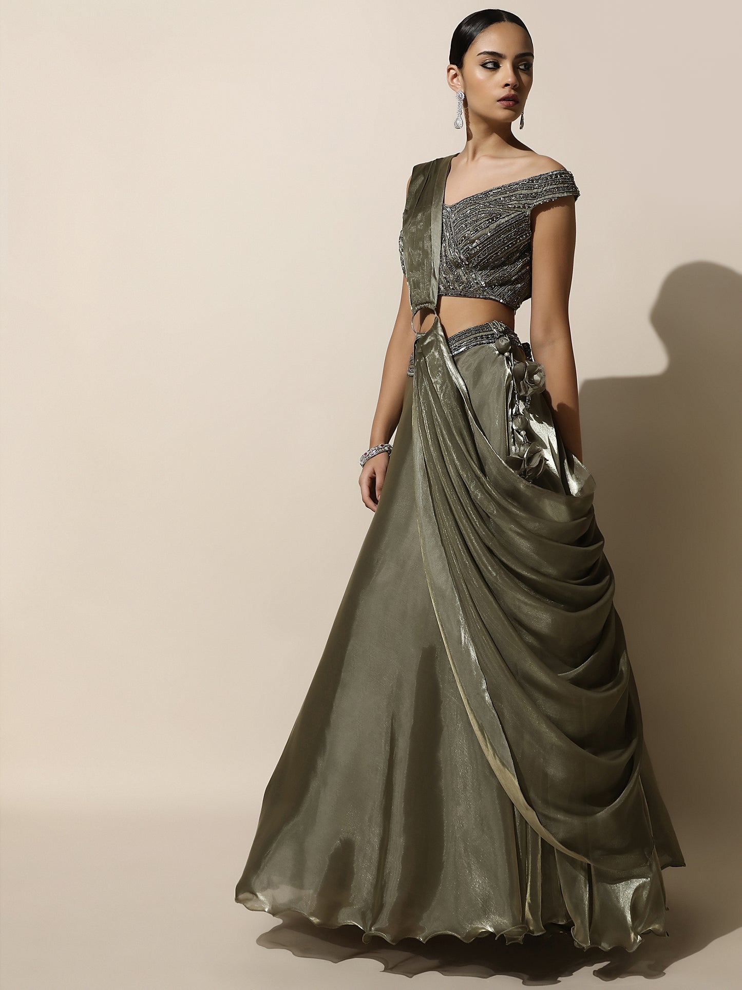 Olive Green Off-Shoulder Lehenga with Pleated Shoulder Drape, Antique Embroidery and Ring Detail