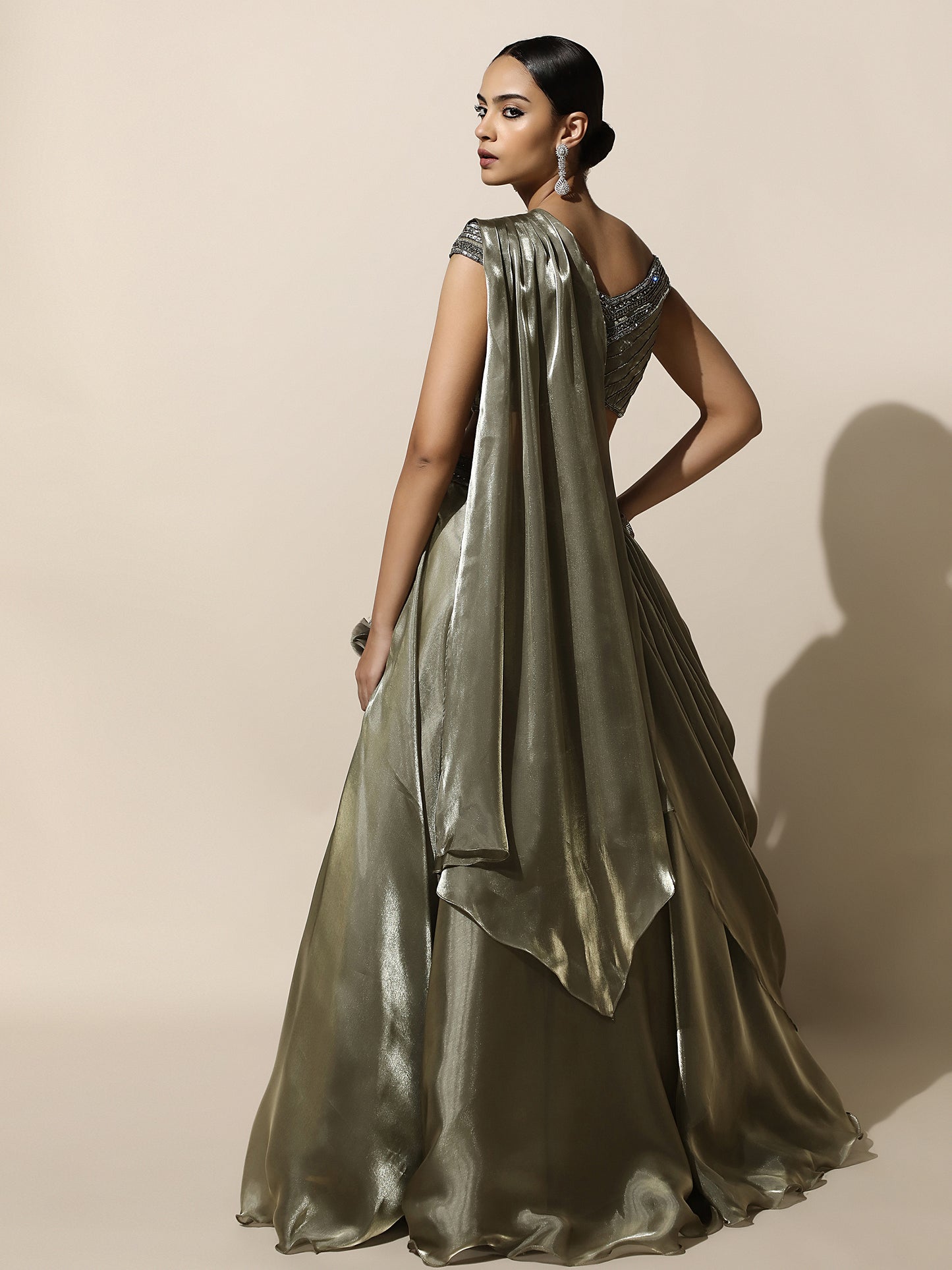 Olive Green Off-Shoulder Lehenga with Pleated Shoulder Drape, Antique Embroidery and Ring Detail